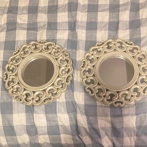 2 small wall mirrors